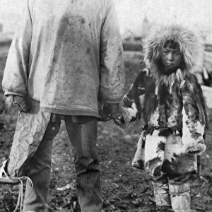ALASKA: ESKIMOS. Eskimo father and daughter, Alaska. Photograph, early 20th century