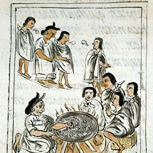 AZTEC SHIELD MAKER. An Aztec craftsman working on a shield over a fire