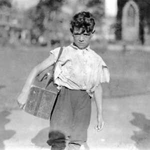 CHILD LABOR: BOOTBLACK, 1924. Young bootblack in New Haven, Connecticut. Photograph by Lewis Hine