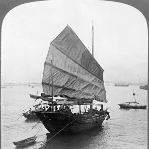 CHINESE JUNK, c1907. Chinese junk sailing in the harbor of Hong Kong, China. Stereograph