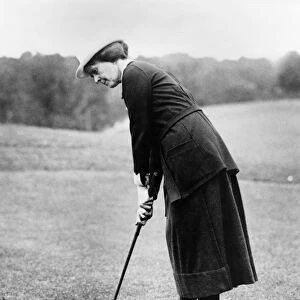 GOLFER, EARLY 20th CENTURY. Elsie Patterson playing golf