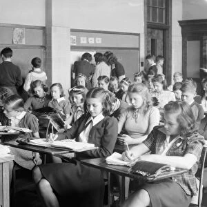HIGH SCHOOL CLASS, c1936. Students in a classroom at Rockville High School in Rockville, Maryland