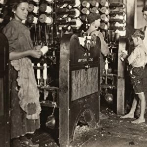 HINE: CHILD LABOR, 1908. Young doffers working at their machines at the Cherryville Mfg