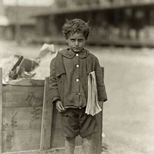 HINE: NEWSBOY, 1913. Four-year-old newsboy selling newspapers barefoot in Tampa, Florida