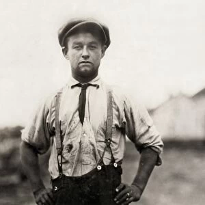 HINE: TINSMITH, 1912. An adolescent tinsmith who works in Northampton, Massachusetts