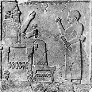 HITTITE RELIEF. Aramean King Barrekup and his scribe. Orthostat relief from Sam al. Basalt, 8th century B. C
