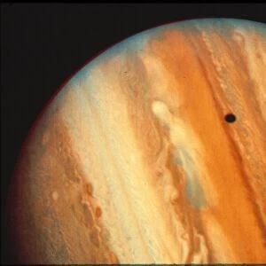 JUPITER. Voyager photograph of Jupiter cloud structure and shadow of Io