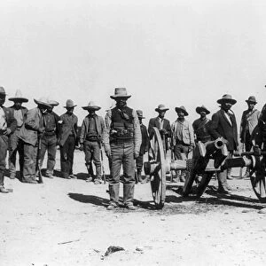 MEXICAN REVOLUTION, 1912. Mexican revolutionary troops photographed with a cannon