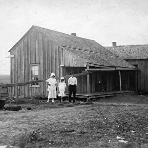 MIGRANT FAMILY, 1913. A dilapidated renters home near West, Texas. Photograph by Lewis Hine