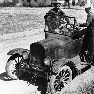 MODEL T FORD, 1941. African American young men and their Model T Ford near Pacolet