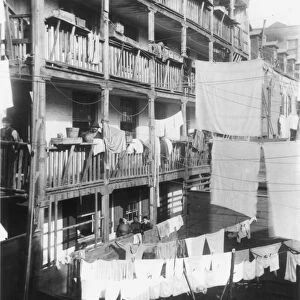 NYC: TENEMENT LIFE. Rear tenement, Roosevelt Street in New York City. Photograph by Jacob Riis