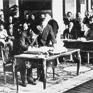 OTTOMAN EMPIRE: KURDS. General Hadi Pasha of Turkey signing the never-ratified