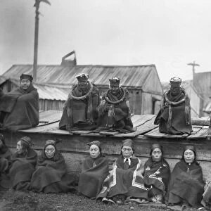 POTLATCH CEREMONY, 1894. Members of the secret Hamatsa Society at a Kwakiutl potlatch ceremony