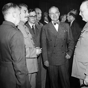 Premier Joseph Stalin of the Soviet Union (second from left), President Harry S. Truman of the United States (center), and Prime Minister Winston S. Churchill of Great Britain (right) photographed on the opening day of the Potsdam Conference, 17 July 1945