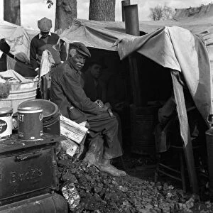 SHARECROPPER, 1939. Evicted sharecroppers in roadside camp along Highway 60, New Madrid County