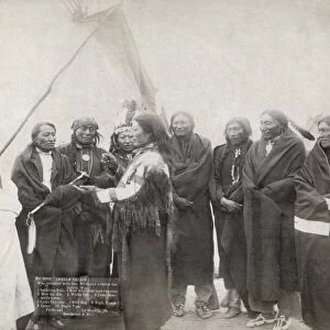SIOUX CHIEFS, 1891. Group portrait of Lakota Sioux chiefs standing in front of a tipi