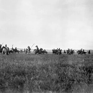 SIOUX HORESMEN, c1907. A group of Sioux Native American men on horseback on the Great Plains