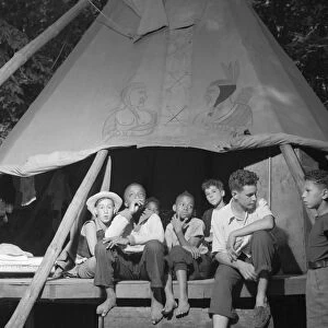 SUMMER CAMP, 1943. Campers in a tent at Camp Nathan Hale, an interracial summer