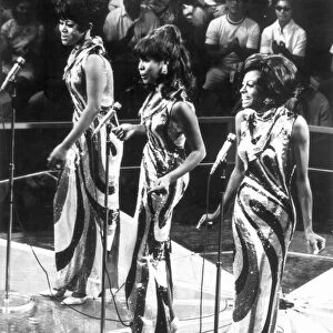 THE SUPREMES, c1963. American vocal trio. From left to right: Florence Ballard, Mary Wilson, and Diana Ross in performance