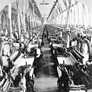 TEXTILE MILL: POWER LOOMS. Power looms in a textile mill at Fall River, Massachusetts