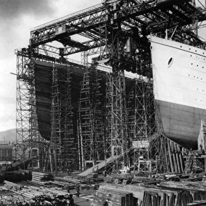TITANIC: CONSTRUCTION, c1910. View of the Olympic (left) and Titanic under construction at the Harland & Wolff shipyards, Belfast, Ireland. Photographed c1910