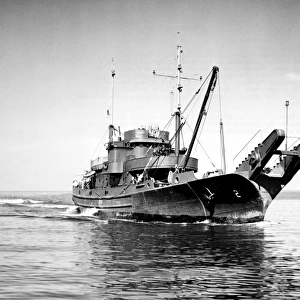 U. S. Navy ship used for laying steel anti-torpedo nets, which were placed at the mouths of harbors or around ships at anchor. Photographed March 1944
