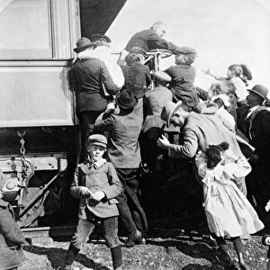 WILLIAM McKINLEY (1843-1901). 25th President of the United States. Children greeting the President at the railroad station of his home town, Canton, Ohio, in the presidential election year of 1900. Stereograph by Strohmeyer and Wayman
