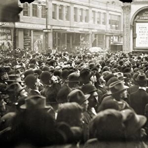WORLD SERIES, 1911. A crowd gathered outside the New York Herald newspaper building in New York City receiving play-by-play information from a playograph during the 1911 World Series between the Philadelphia Athletics and the New York Giants, October 1911