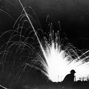 WWI: GONDRECOURT, 1918. An explosion at night in Gondrecourt, France. Photographed by J