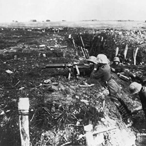 WWI: TRENCHES, c1915. German machine gunners in a trench. Photograph, c1915