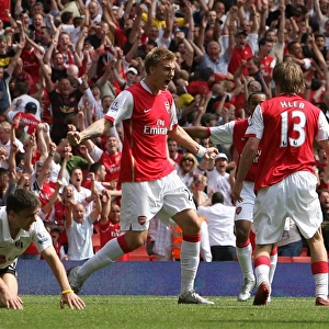 Alex Hleb celebrates scoring the 2nd Arsenal goal with Nicklas Bendtner