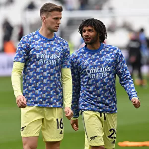 Arsenal Players Mohamed Elneny and Rob Holding Warm Up Ahead of West Ham United Clash (Premier League 2021-22)