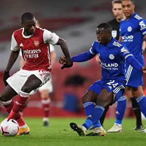 Arsenal vs Leicester City: Pepe vs Mendy - Premier League Clash Amidst Empty Stands (2020-21)