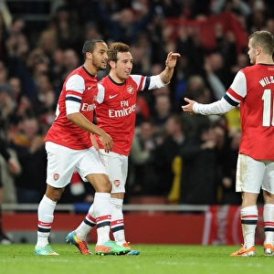 Arsenal's Big Three: Cazorla, Walcott, and Wilshere Celebrate First Goal Against Tottenham in FA Cup