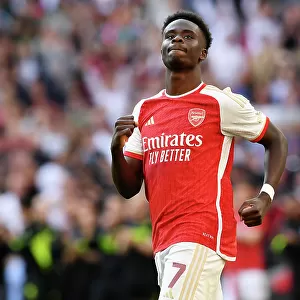 Arsenal's Bukayo Saka Scores the Winning Goal: Arsenal Celebrate Community Shield Victory over Manchester City (2023-24)