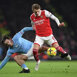 Arsenal's Martin Odegaard Outsmarts Jack Grealish: Intense Battle in Arsenal vs. Manchester City