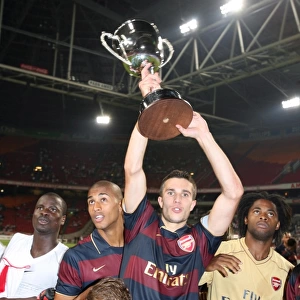 Arsenal's Victory Celebration: Robin van Persie, Mathieu Flamini, Armand Traore, and Alex Song