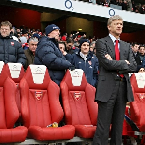 Arsene Wenger the Arsenal Manager with JK (Masseur) to his right. Arsenal 2: 2 Everton