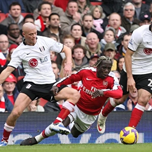 Bacary Sagna (Arsenal) Paul Konchesky & Clint Dempsey (Fulham)
