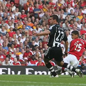 Denilson shoots past Shay Given to score the 3rd Arsenal goal