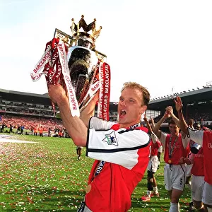 Dennis Bergkamp with the FA Barclaycard Premiership Trophy after Arsenal's 4:3 Victory over Everton, FA Barclaycard Premiership, Arsenal Stadium, Highbury, London, May 11, 2002