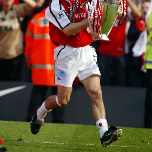 Fredrik Ljungberg Celebrates with the FA Barclaycard Premiership Trophy after Arsenal's 4:3 Win over Everton, Arsenal Stadium, Highbury, London, May 11, 2002