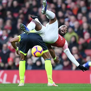 Intense Face-Off: Lacazette vs. Jorgensen in Arsenal's Premier League Battle