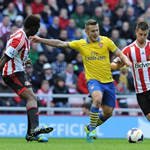 Jack Wilshere (Arsenal) Modibo Diakite and Valentin Roberge (Sunderland). Sunderland 1: 3 Arsenal