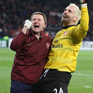 Manuel Almunia celebrates the 2nd Arsenal goal with physio Gary Lewin