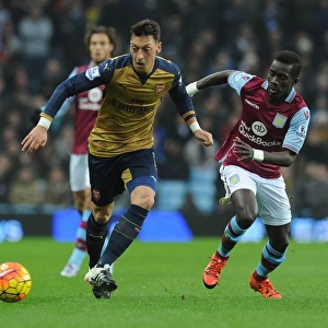 Mesut Ozil Faces Intense Pressure from Idrissa Gana: Aston Villa vs Arsenal, Premier League 2015-16