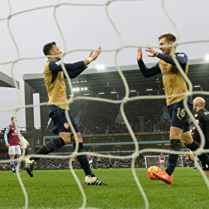 Ramsey and Ozil's Jubilant Moment: Arsenal's Victory over Aston Villa, Premier League 2015-16