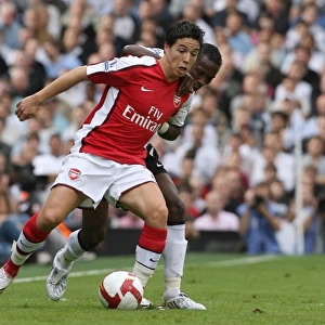 Samir Nasri (Arsenal) John Pantsil (Fulham)