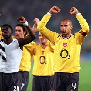 Thierry Henry and Kolo Toure (Arsenal) celebrates at the final whistle