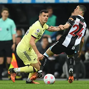 Xhaka vs Almiron: Intense Battle in Newcastle United vs Arsenal Premier League Clash
